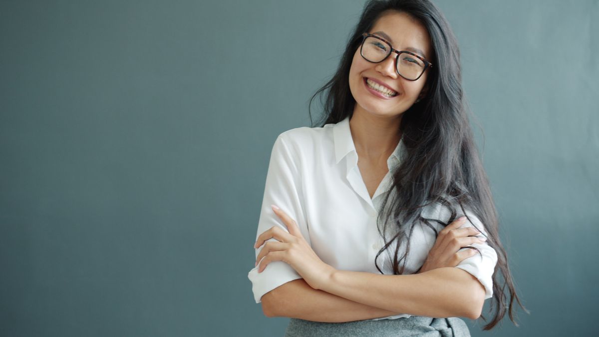 teeth whitening vashi — woman with a bright, confident smile at a Sector 17 Navi Mumbai cosmetic dental clinic